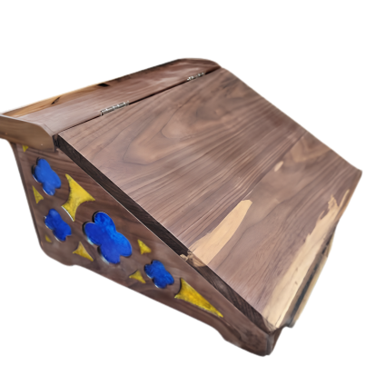 walnut calligraphy desk with yellow and blue poured resin in quatrefoil cutouts