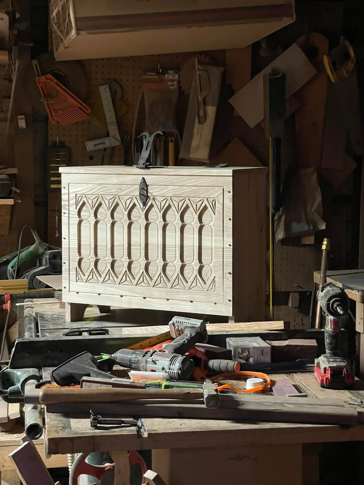 carved gothic chest during construction 